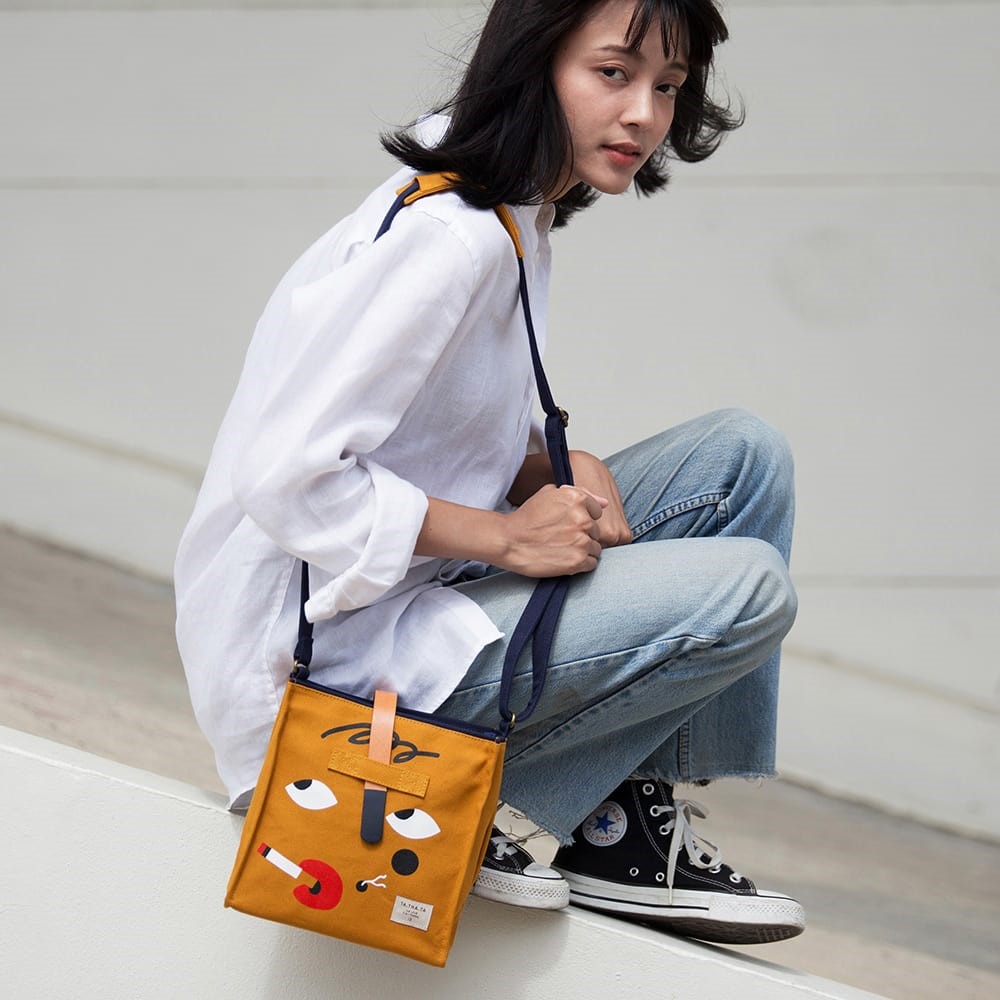 model with ta.tha.ta brown tote bag available on sift and pick singapore